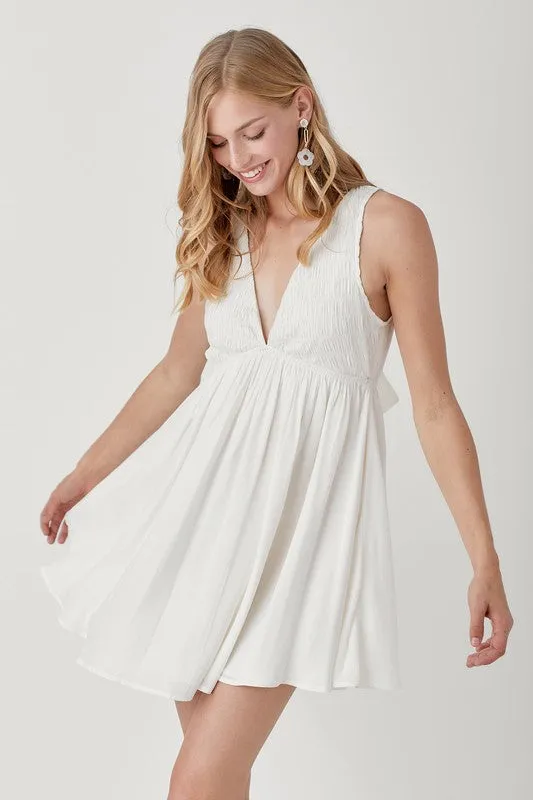 SHAWNA SMOCK SLEEVELESS MINI DRESS
